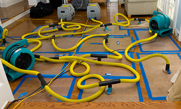 Professional Storm Water Damage Restoration technician working in Far Hills, NJ